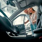At a car dealership, buying a car