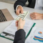 Businessman get dollar money bribery in office. corruption conce