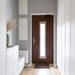 Corridor interior with an entrance door in a private house.