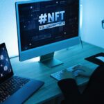 Young woman buying NFT on Blockchain market – New Technology Token Concept – Focus on right computer screen