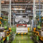 Stopped equipment with car frame at a closed car factory