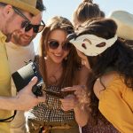 Friends Looking At Photo Print